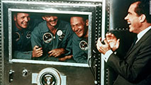 Apollo 11 with Nixon watching on TV